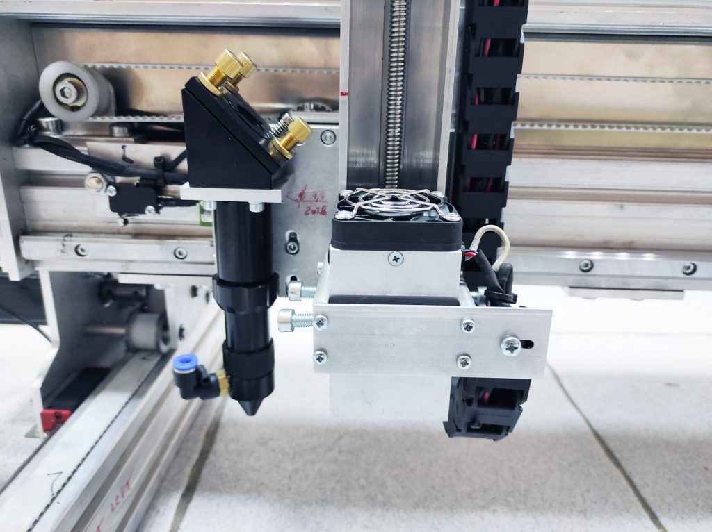 An Endurance 80 watt Custom Co2 Laser Machine with 6x5' (2x1.7 m) working size area