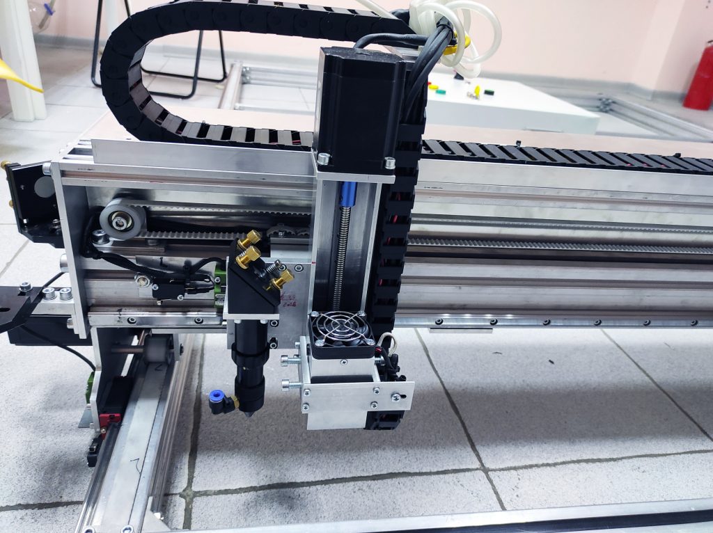 An Endurance 80 watt Custom Co2 Laser Machine with 6x5' (2x1.7 m) working size area